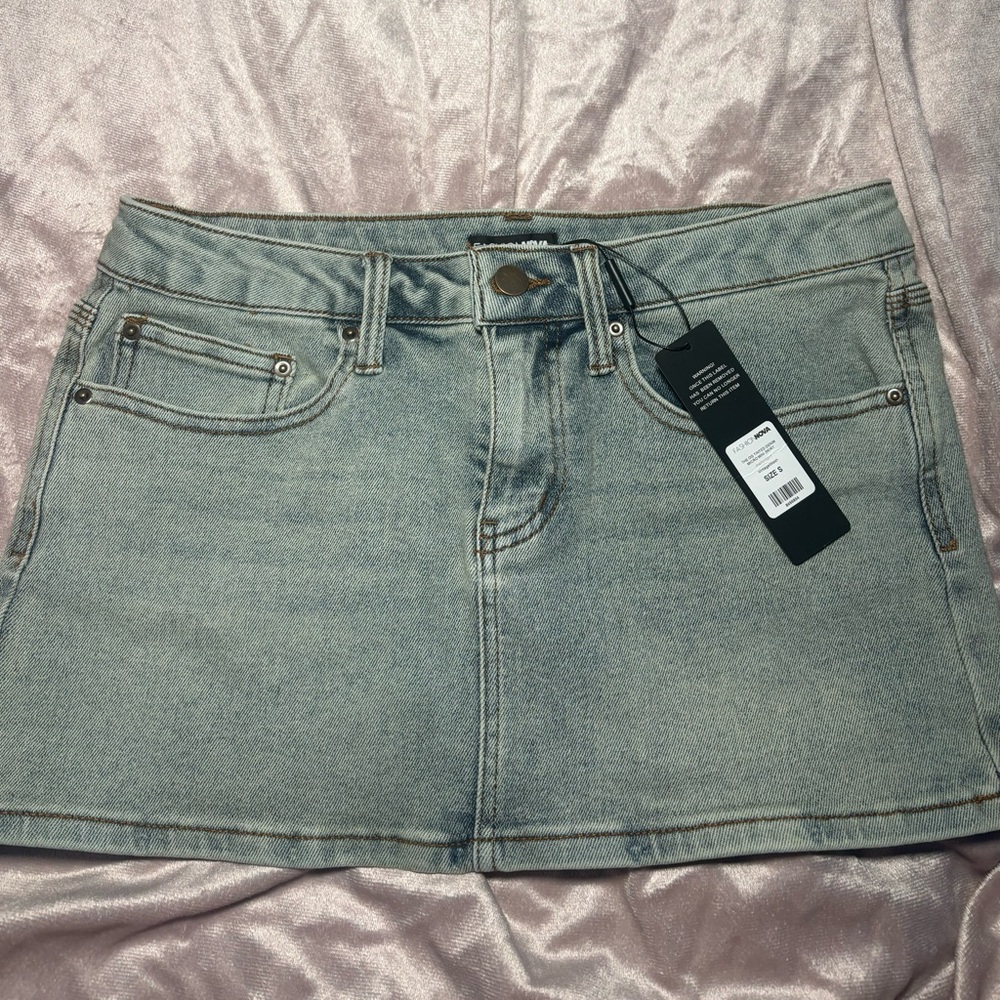 Acid wash denim mini skirt
